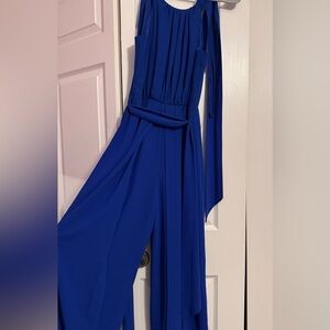Blue jumpsuit with tie back detail, ideal for a special occasion